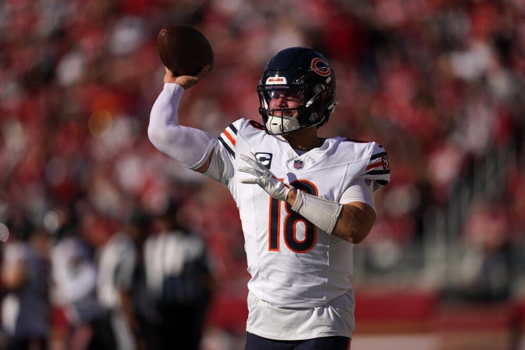 Dec 8, 2024; Santa Clara, California, USA; Chicago Bears quarterback Caleb Williams (18) warms up on the sideline during action against the San Francisco 49ers in the first quarter at Levi's Stadium