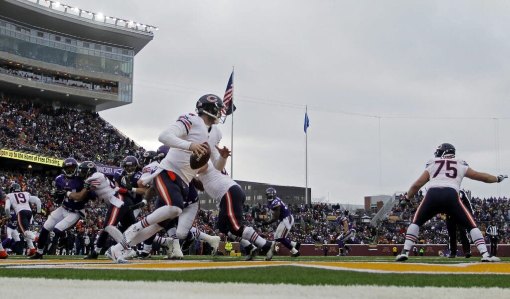 Dec 28, 2014; Minneapolis, MN, USA; Chicago Bears quarterback Jay Cutler (6) scrambles against the Minnesota Vikings in the fourth quarter at TCF Bank Stadium. The Vikings win 13-9.