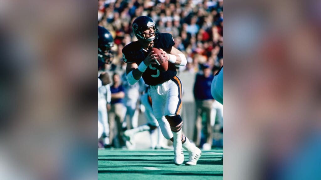 Oct 27, 1985; Chicago, IL, USA; FILE PHOTO; Chicago Bears quarterback Jim McMahon (9) in action against the Minnesota Vikings at Soldier Field.