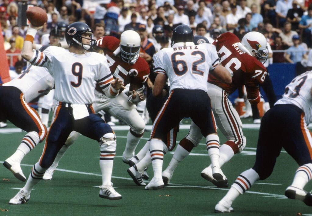 Oct 14, 1984; St. Louis, MO, USA; FILE PHOTO; Chicago Bears quarterback Jim McMahon (9) in action against the St. Louis Cardinals at Busch Stadium.