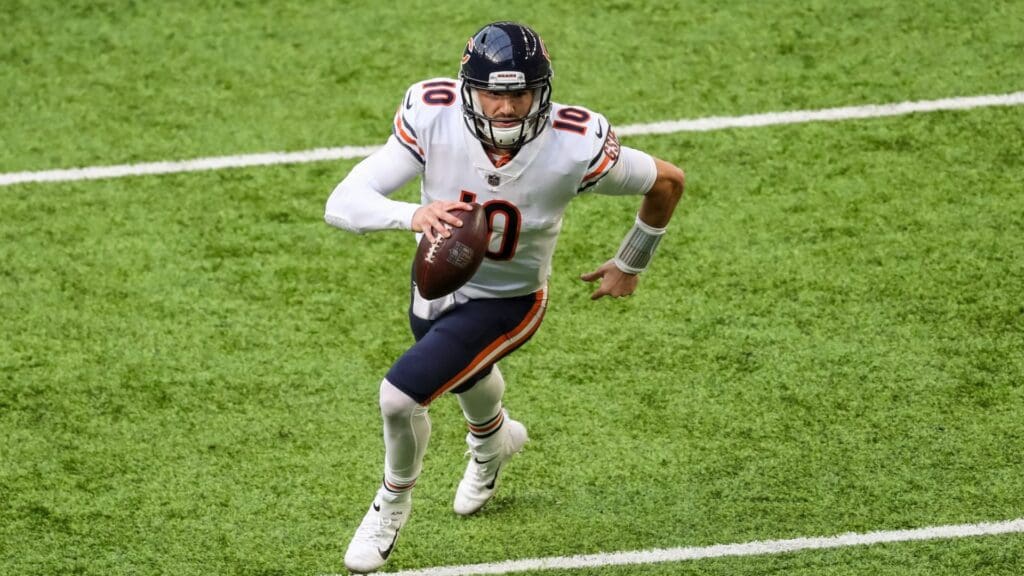 Dec 20, 2020; Minneapolis, Minnesota, USA; Chicago Bears quarterback Mitchell Trubisky (10) runs with the ball during the second quarter against the Minnesota Vikings at U.S. Bank Stadium.