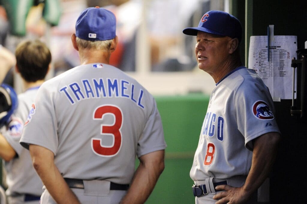 August 23, 2010; Washington, DC, USA; Chicago Cubs interim manager Mike Quade (8) talks with bench coach Alan Trammell (3) during a game against the Washington Nationals at Nationals Park.