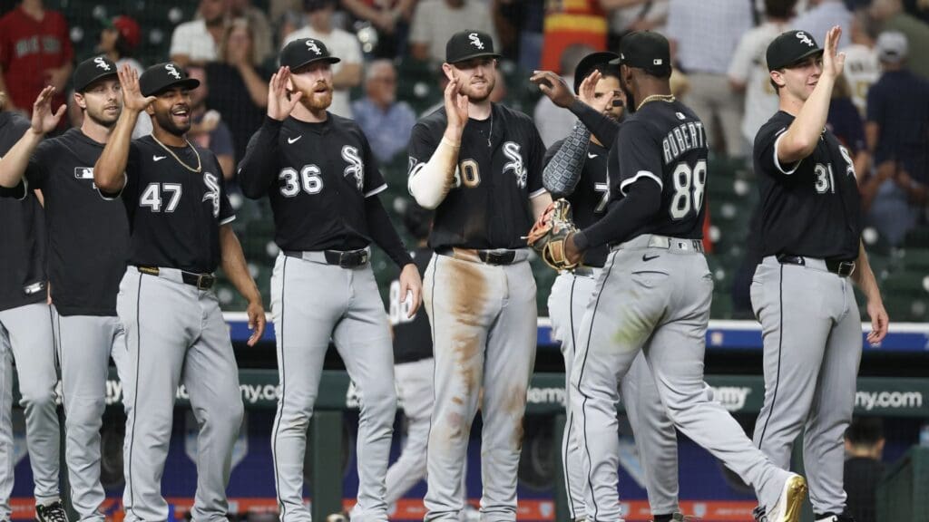Jun 10, 2025; Houston, Texas, USA; Chicago White Sox center fielder Luis Robert Jr. (88) celebrates with his team after defeating the Houston Astros at Daikin Park.