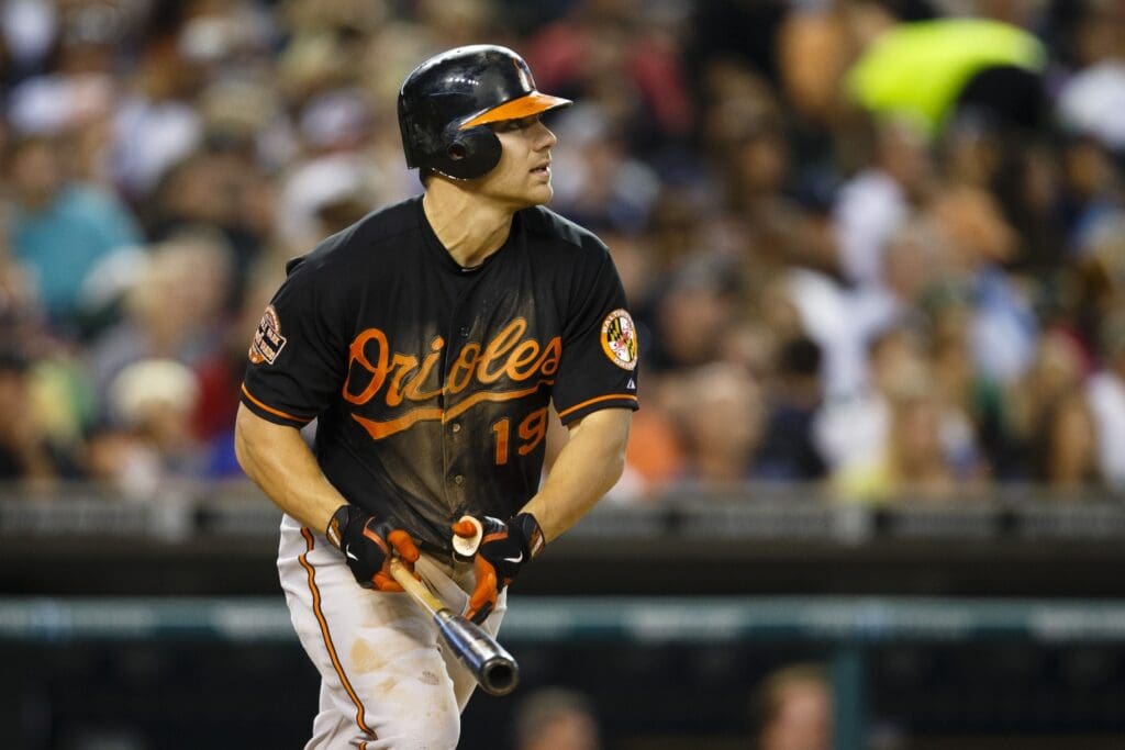 August 17, 2012; Detroit, MI, USA; Baltimore Orioles Chris Davis (19) hits a single during the fifth inning against the Detroit Tigers at Comerica Park.