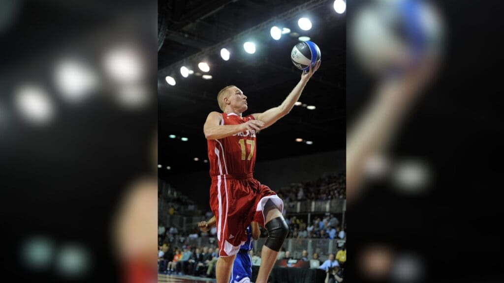 Feb 24, 2012; Orlando, FL, USA; Golden State Warriors former guard Chris Mullins (17) lays the ball up during the 2012 NBA All-Star Celebrity Game at the Orange County Convention Center.