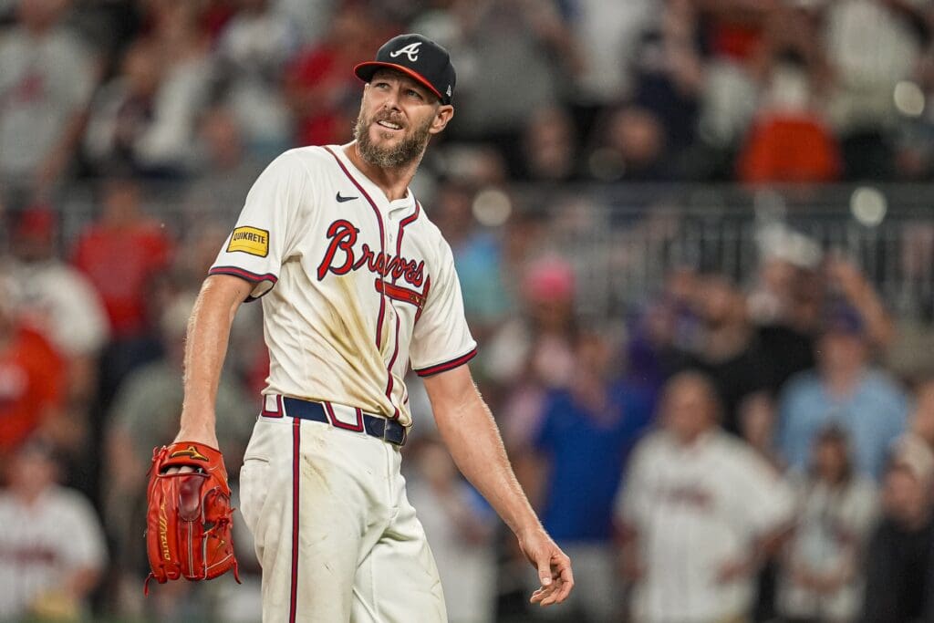 Jun 18, 2025; Cumberland, Georgia, USA; Atlanta Braves starting pitcher Chris Sale (51) watches the ball after a hit by the New York Mets during the ninth inning at Truist Park.