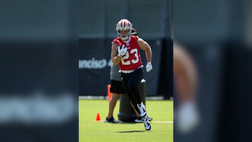 Jun 11, 2025; Santa Clara, CA, USA; San Francisco 49ers running back Christian McCaffrey (23) runs a play from scrimmage during a team OTA at Levi's Stadium.