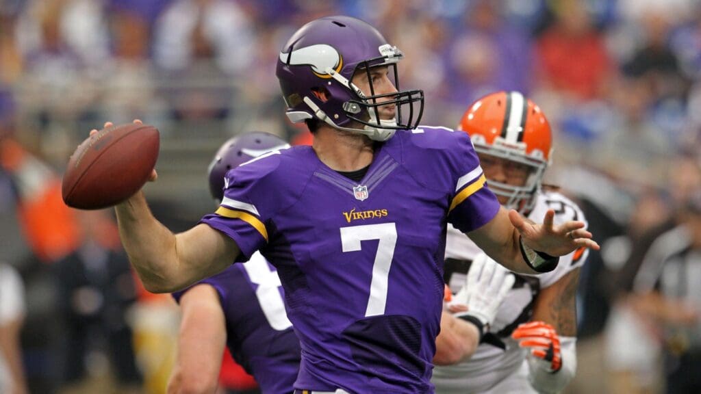 Sep 22, 2013; Minneapolis, MN, USA; Minnesota Vikings quarterback Christian Ponder (7) throws during the second quarter against the Cleveland Browns at Mall of America Field at H.H.H. Metrodome.
