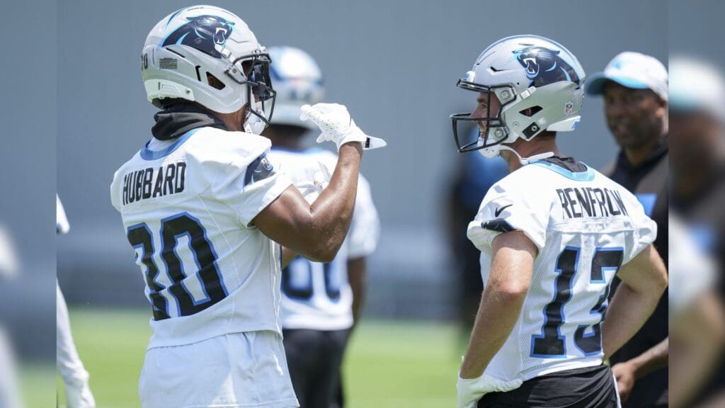Jun 11, 2025; Charlotte, NC, USA; Carolina Panthers running back Chuba Hubbard (30) talks with wide receiver Hunter Renfrow (13) during minicamp at Bank of America Stadium.