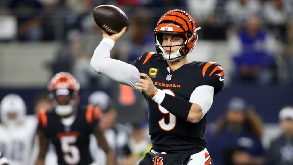 Dec 9, 2024; Arlington, Texas, USA; Cincinnati Bengals quarterback Joe Burrow (9) throws a pass against the Dallas Cowboys in the first quarter at AT&T Stadium.