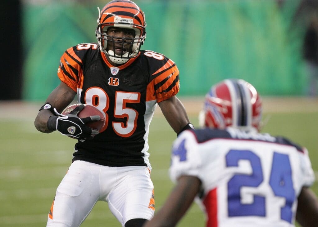 Dec 24, 2005; Cincinnati, OH, USA; Cincinnati Bengals wide receiver (85) Chad Johnson runs after a catch and tries to elude Buffalo Bills cornerback (24) Terrence McGee at Paul Brown Stadium.