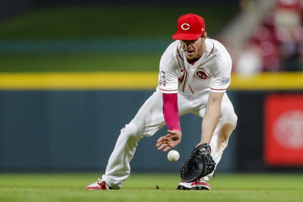 May 9, 2023; Cincinnati, Ohio, USA; Cincinnati Reds first baseman Wil Myers (4) fields a ground ball hit by New York Mets shortstop Francisco Lindor (not pictured) in the ninth inning at Great American Ball Park.
