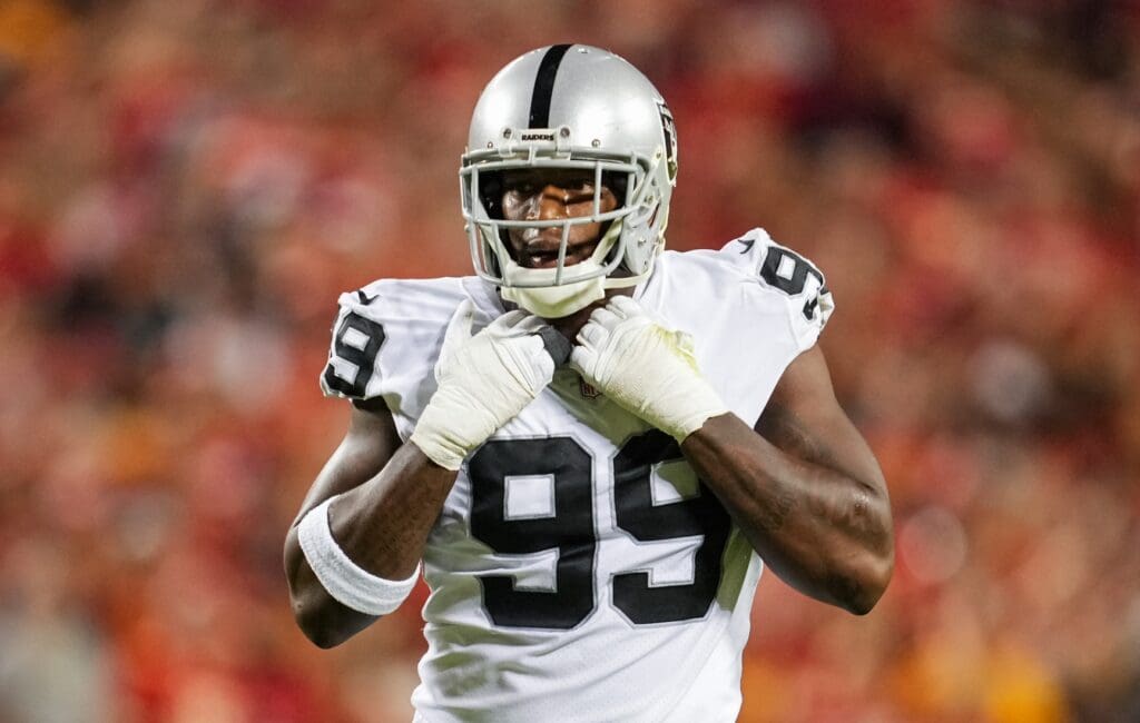 Oct 10, 2022; Kansas City, Missouri, USA; Las Vegas Raiders defensive end Clelin Ferrell (99) gets ready before the snap during the second half against the Kansas City Chiefs at GEHA Field at Arrowhead Stadium.