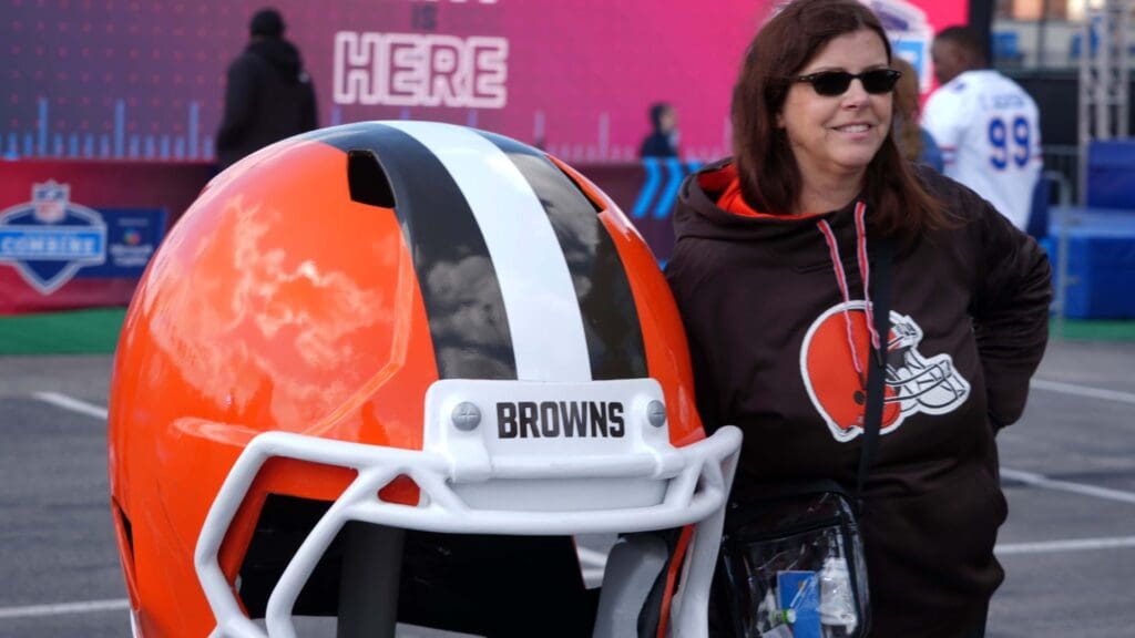 Feb 27, 2025; Indianapolis, IN, USA; A Cleveland Browns fan poses at the 2025 NFL Scouting Combine Experience at Lucas Oil Stadium.