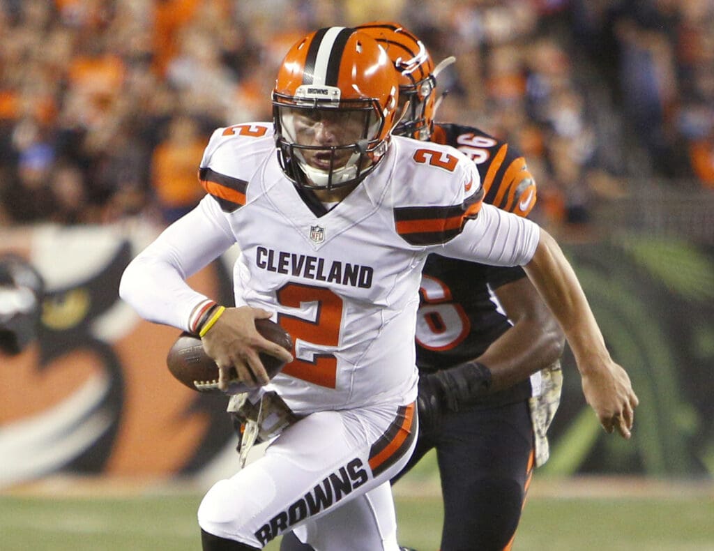 Nov 5, 2015; Cincinnati, OH, USA; Cleveland Browns quarterback Johnny Manziel (2) runs against the Cincinnati Bengals during the first quarter at Paul Brown Stadium.