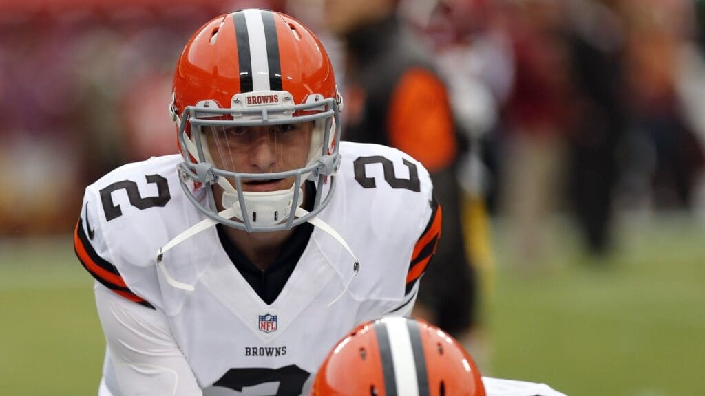Aug 18, 2014; Landover, MD, USA; Cleveland Browns quarterback Johnny Manziel (2) takes a snap during warmups prior to the Browns' game against the Washington Redskins at FedEx Field.