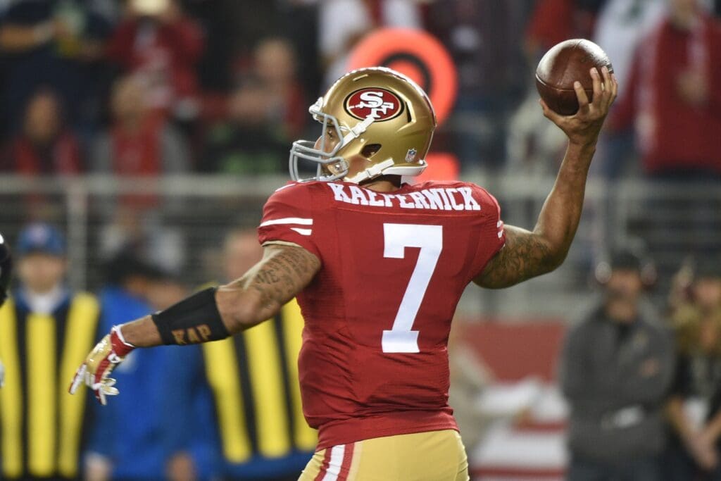 November 27, 2014; Santa Clara, CA, USA; San Francisco 49ers quarterback Colin Kaepernick (7) passes the football during the first quarter against the Seattle Seahawks at Levi's Stadium. The Seahawks defeated the 49ers 19-3.