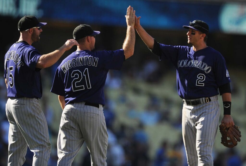 August 28, 2011; Los Angeles, CA, USA; Colorado Rockies shortstop Troy Tulowitzki (2) celebrates with his team after the game against the Los Angeles Dodgers at Dodger Stadium. Colorado Rockies won 7-6.