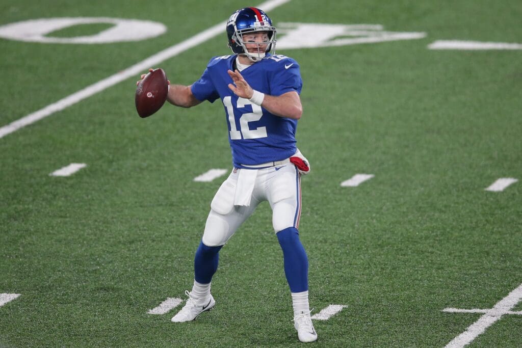 Dec 20, 2020; East Rutherford, New Jersey, USA; New York Giants quarterback Colt McCoy (12) drops back to pass against the Cleveland Browns during the second quarter at MetLife Stadium.