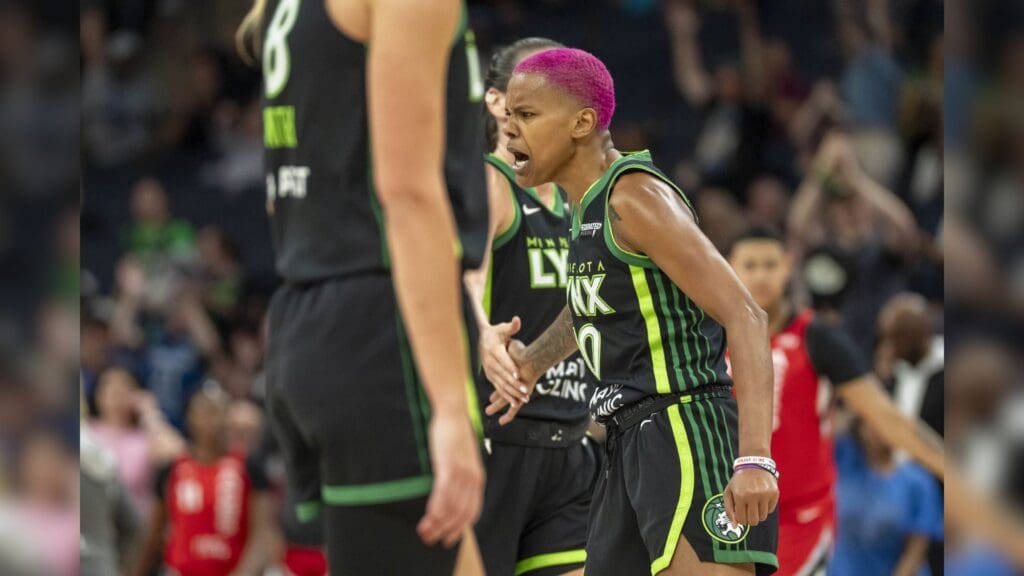 Jun 17, 2025; Minneapolis, Minnesota, USA; Minnesota Lynx guard Courtney Williams (10) reacts after making a three-point shot against the Las Vegas Aces in the second half at Target Center.