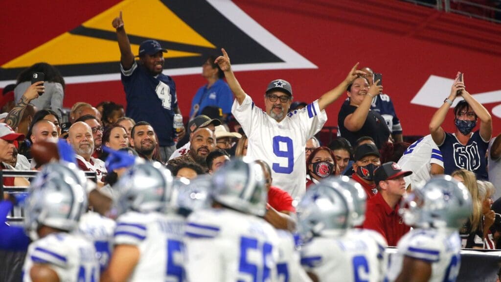 August 13, 2021; Glendale, Arizona, USA; Cowboys' fans celebrate a fumble recovery against the Cardinals during the first quarter at the State Farm Stadium in Glendale. Patrick Breen-The Republic Nfl Preseason Cardinals Vs Cowboys