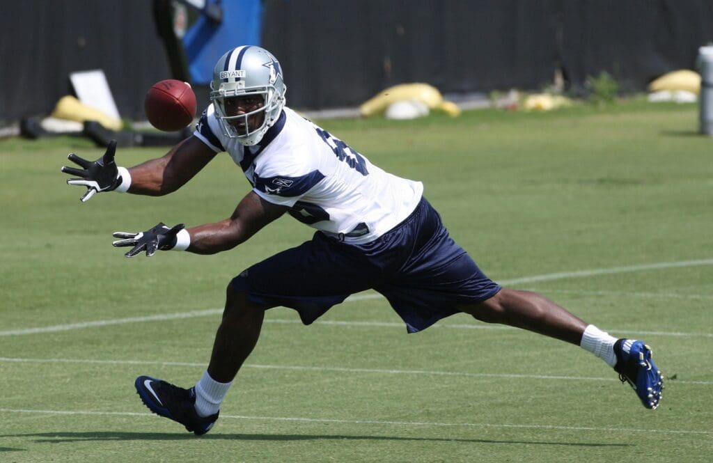 May 17, 2010; Irving, TX, USA; Dallas Cowboys first round draft pick receiver Dez Bryant (88) makes a catch during organized team activities at Dallas Cowboys headquarters.