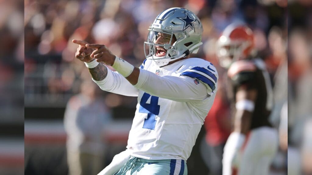 Sep 8, 2024; Cleveland, Ohio, USA; Dallas Cowboys quarterback Dak Prescott (4) celebrates after a touchdown during the first half against the Cleveland Browns at Huntington Bank Field.