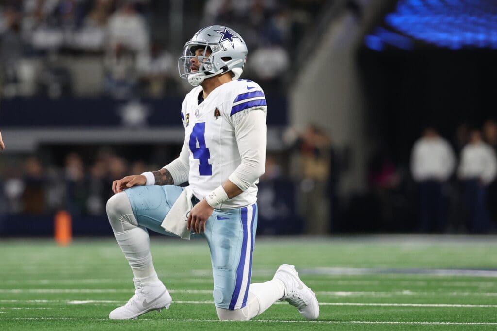 Jan 14, 2024; Arlington, Texas, USA; Dallas Cowboys quarterback Dak Prescott (4) reacts after a play against the Green Bay Packers during the second half for the 2024 NFC wild card game at AT&T Stadium