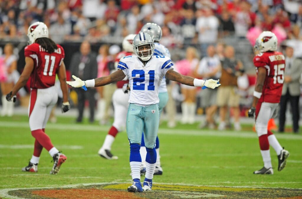 Oct. 12, 2008; Glendale, AZ, USA; Dallas Cowboys cornerback (21) Adam Jones gestures towards a referee during the game against the Arizona Cardinals at University of Phoenix Stadium. Arizona defeated Dallas 30-24 in overtime.