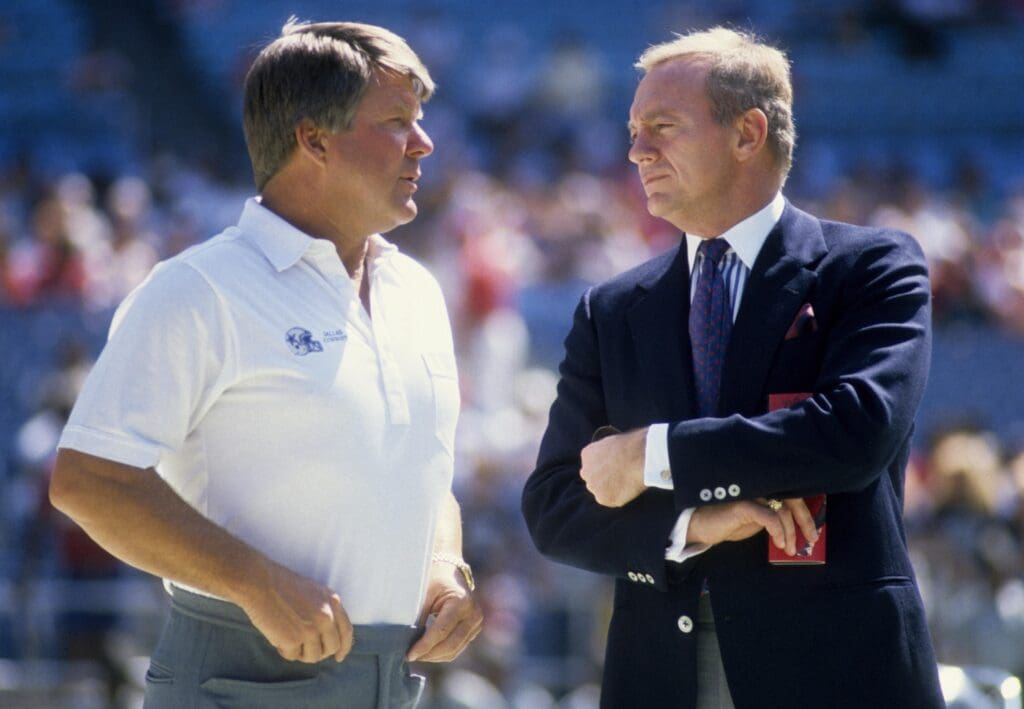 Sep 17, 1989; Atlanta, GA, USA; Dallas Cowboys owner Jerry Jones (right) and head coach Jimmy Johnson prior to the game against the Atlanta Falcons at Fulton County Stadium.