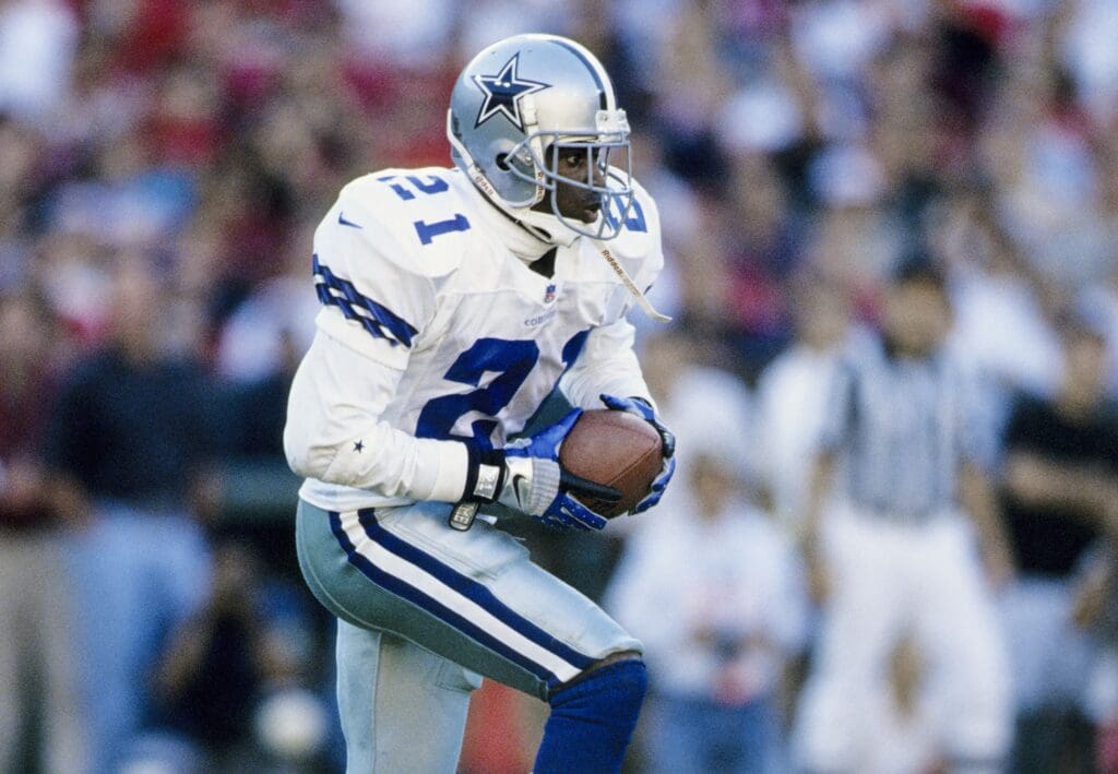 Nov 2, 1997; San Francisco, CA, USA; FILE PHOTO; Dallas Cowboys punt returner Deion Sanders (21) runs with the ball against the San Francisco 49ers at Candlestick Park.