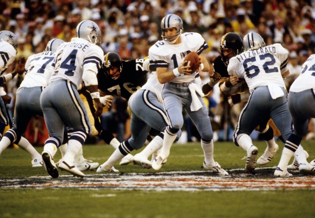 Jan 21, 1979; Miami, FL, USA, FILE PHOTO; Dallas Cowboys quarterback (12) Roger Staubach in action against the Pittsburgh Steelers during Super Bowl XIII at the Orange Bowl. The Steelers defeated the Cowboys 35-31.