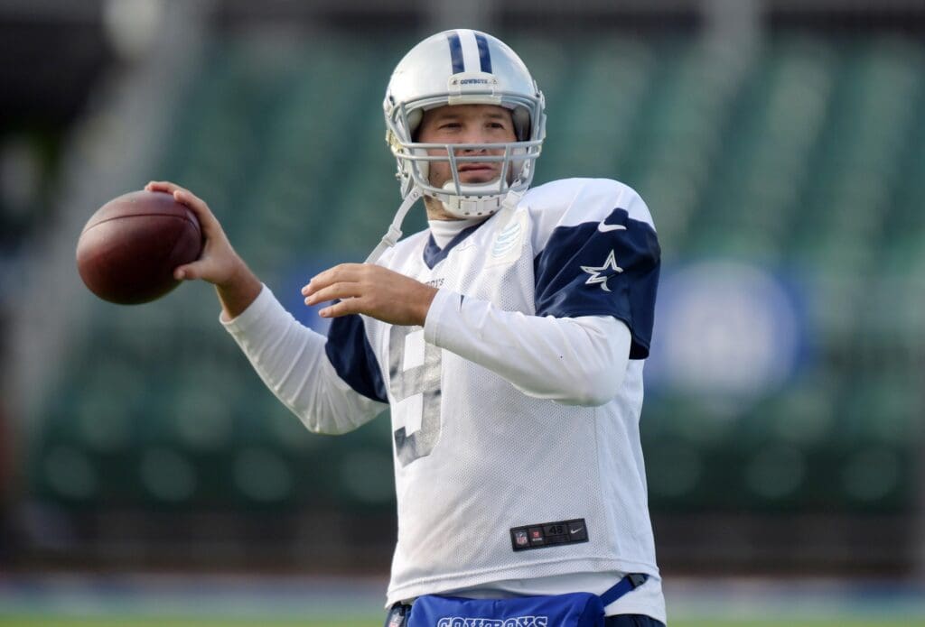 Nov 7, 2014; London, UNITED KINGDOM; Dallas Cowboys quarterback Tony Romo (9) throws a pass at practice at Allianz Park in advance of the NFL International Series game against the Jacksonville Jaguars