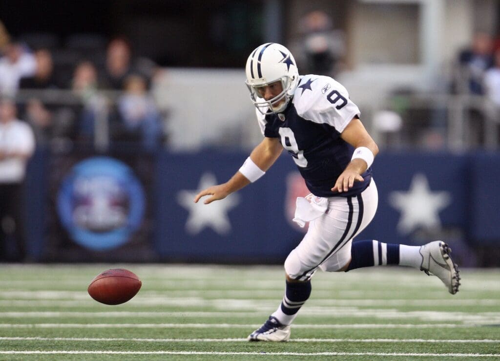 Nov 26, 2009; Arlington, TX, USA; Dallas Cowboys quarterback Tony Romo (9) fumbles the ball in the first quarter against the Oakland Raiders at Cowboys Stadium.