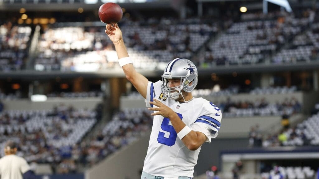Sep 13, 2015; Arlington, TX, USA; Dallas Cowboys quarterback Tony Romo (9) throws prior to the game against the New York Giants at AT&T Stadium.