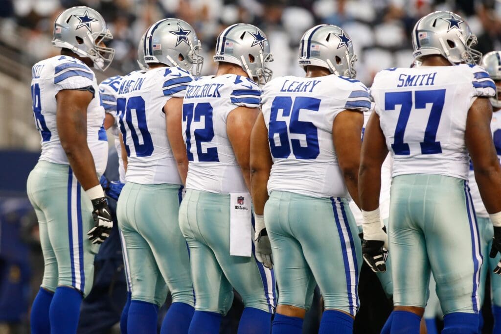 Dallas Cowboys tackle Jermey Parnell (78) and guard Zack Martin (70) and center Travis Frederick (72) and guard Ronald Leary (65) and tackle Tyron Smith (77) on the field before the game against the Detroit Lions