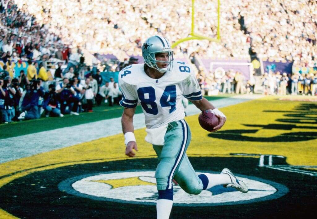 Jan 28, 1996; Tempe, AZ, USA; FILE PHOTO; Dallas Cowboys tight end #84 Jay Novacek scores a touchdown against the Pittsburgh Steelers in the 2nd Quarter of Super Bowl XXX at Sun Devil Stadium. The Cowboys defeated the Steelers 27-17.