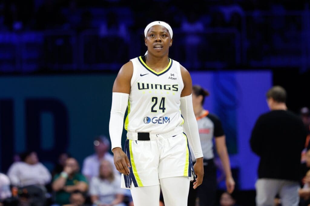 Jun 24, 2025; Arlington, Texas, USA; Dallas Wings guard Arike Ogunbowale (24) reacts against the Atlanta Dream during the second half at College Park Center.