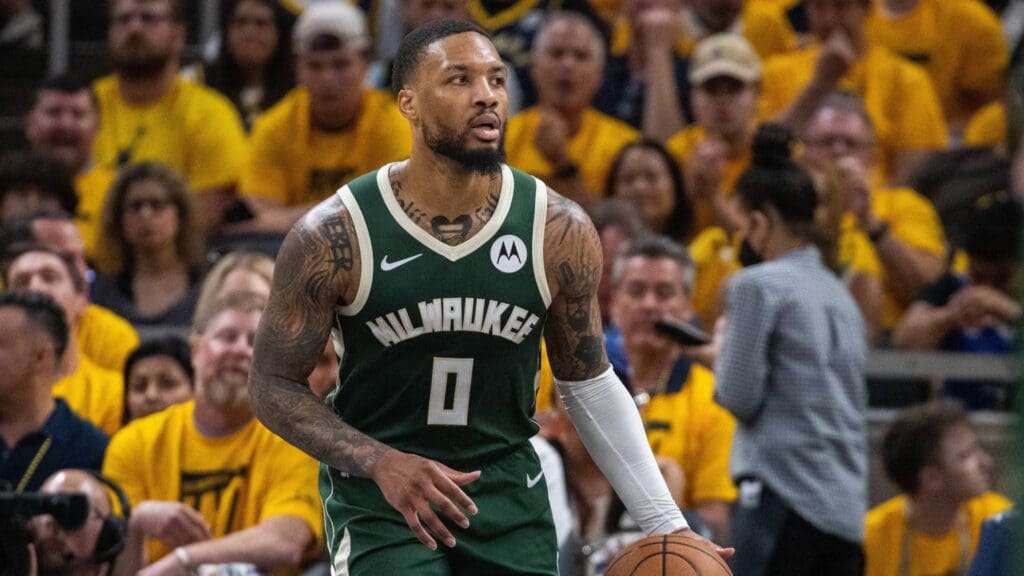 May 2, 2024; Indianapolis, Indiana, USA; Milwaukee Bucks guard Damian Lillard (0) dribbles the ball during game six of the first round for the 2024 NBA playoffs against the Indiana Pacers at Gainbridge Fieldhouse