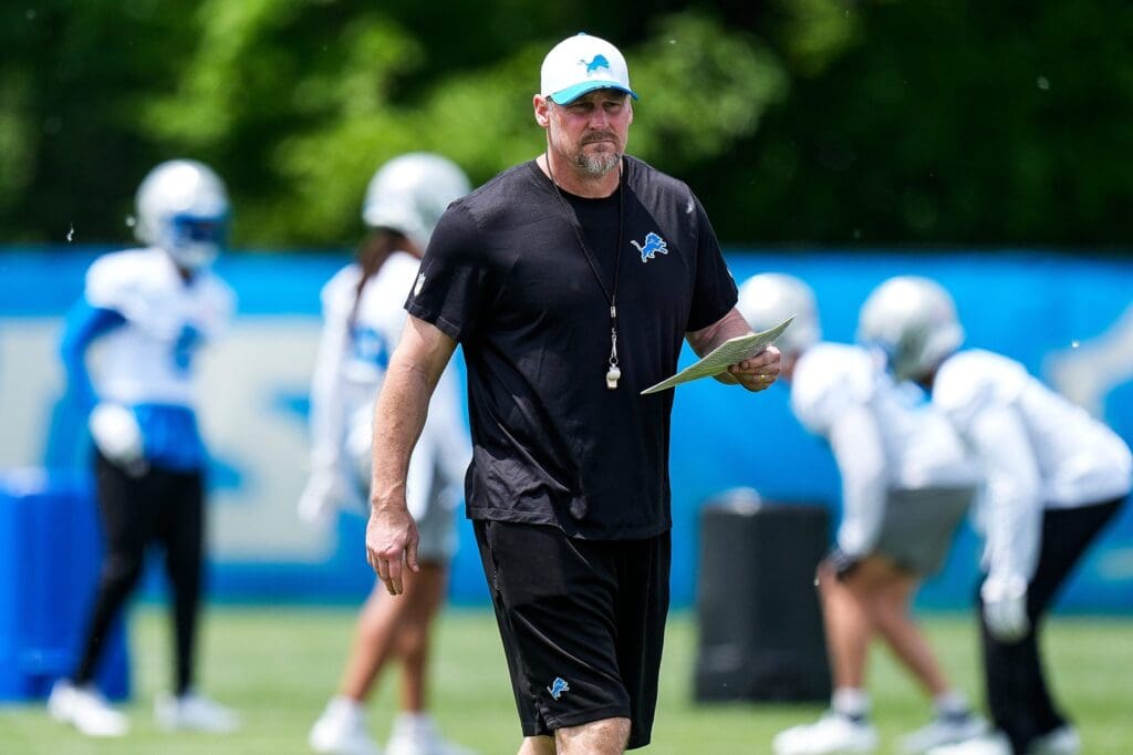 Detroit Lions head coach Dan Campbell watches practices during OTA at Meijer Performance Center in Allen Park on Friday, May 30, 2025.