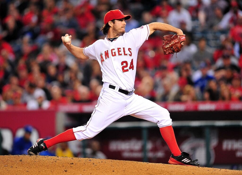 May 3, 2012; Anaheim, CA, USA; Los Angeles Angels starting pitcher Dan Haren (24) pitches in the third inning against the Toronto Blue Jay at Angel Stadium.