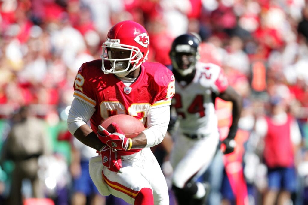 Oct 24, 2004; Kansas City, MO, USA; Kansas City Chiefs wide receiver #82 Dante Hall looks for room to run a kickoff back against the Atlanta Falcons defense in 1st half action at Arrowhead Stadium. The Chiefs won the game 56-14.