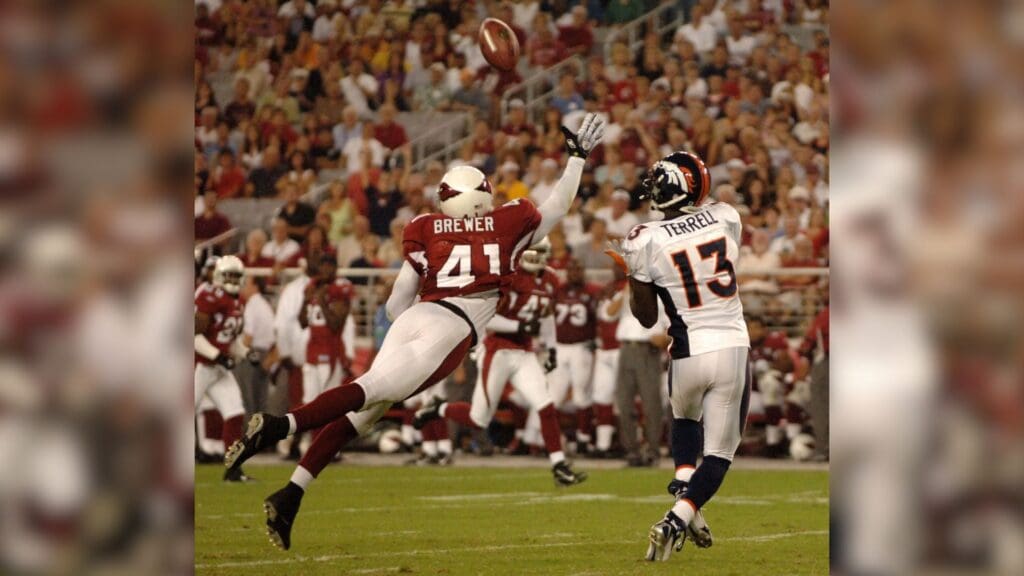 Aug. 31, 2006; Glendale, AZ, USA; Arizona Cardinals safety (41) Jack Brewer breaks up a pass intended for Denver Broncos wide receiver (13) David Terrell at Cardinals Stadium in Glendale, AZ.