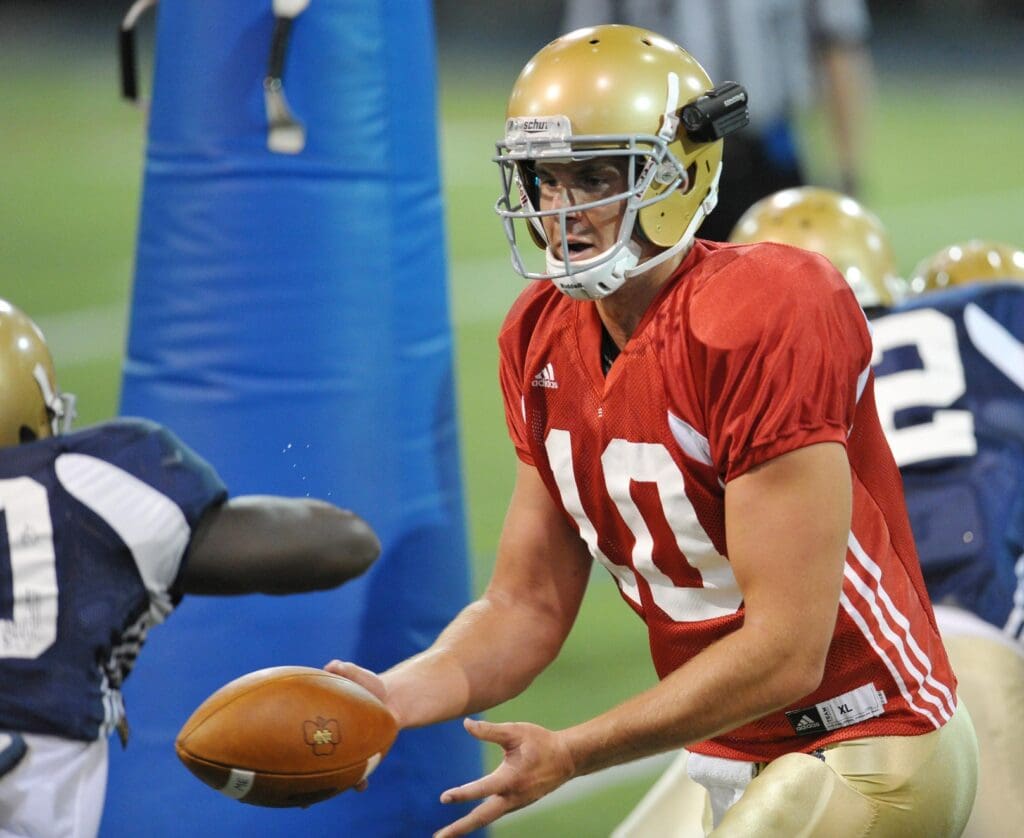 Mar. 26, 2011; South Bend, IN, USA; Notre Dame Fighting Irish quarterback Dayne Crist (10) hands the ball off during practice at the Loftus Center.