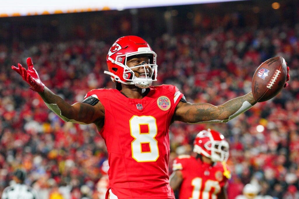 Dec 8, 2024; Kansas City, Missouri, USA; Kansas City Chiefs wide receiver DeAndre Hopkins (8) celebrates after scoring against the Los Angeles Chargers during the first half at GEHA Field at Arrowhead Stadium.