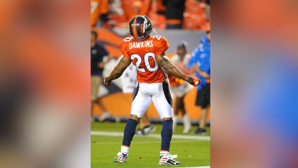 Sept 12, 2011; Englewood, CO, USA; Denver Broncos defensive back Brian Dawkins (20) reacts after a turnover on downs during the first quarter against the Oakland Raiders at Sports Authority Field. The Raiders defeated the Broncos 23-20.