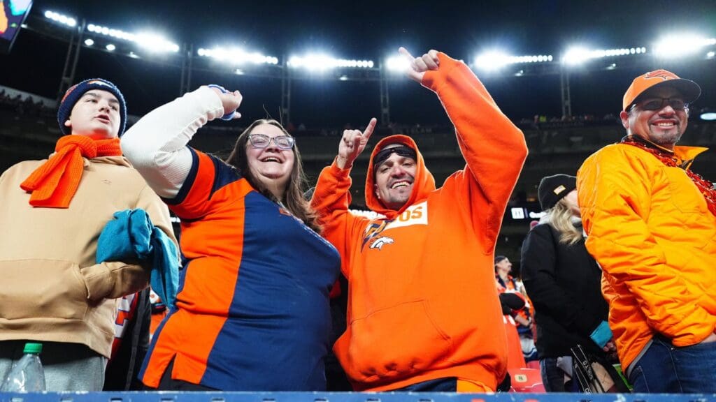 Dec 15, 2024; Denver, Colorado, USA; Denver Broncos fans cheer following the game against the Indianapolis Colts at Empower Field at Mile High