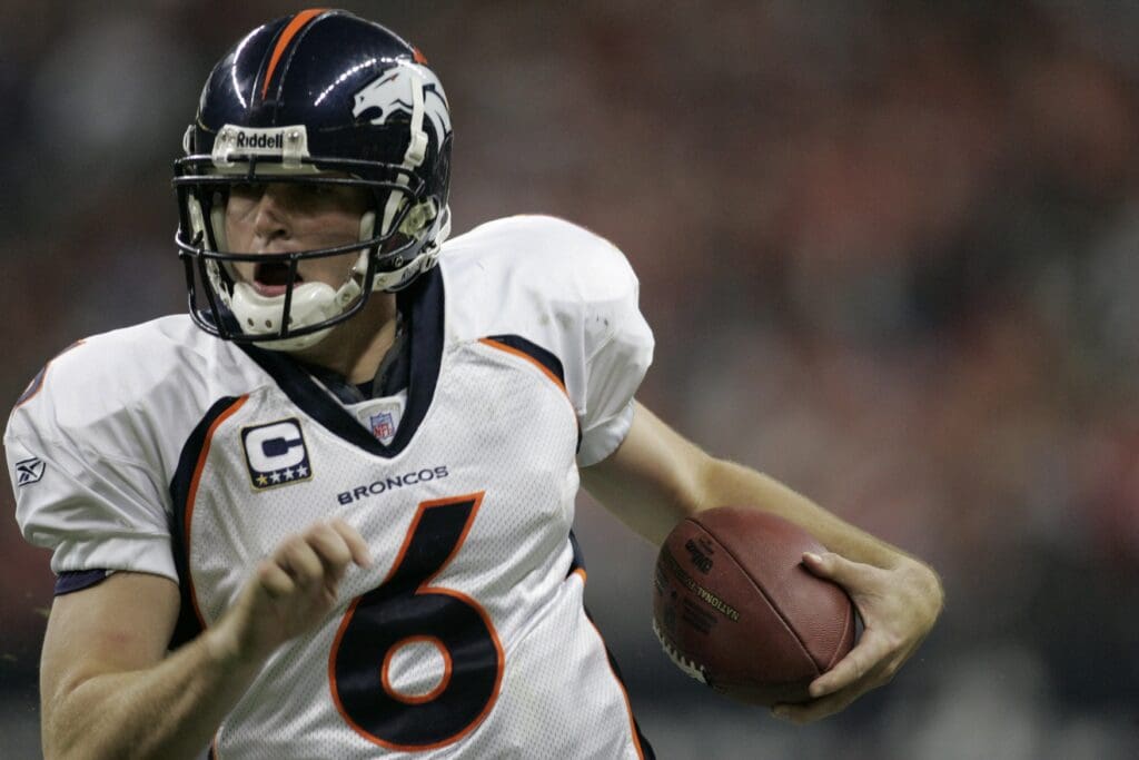 Dec 13, 2007; Houston, TX, USA; Denver Broncos quarterback Jay Cutler (6) runs the ball against the Houston Texans in the third quarter at Reliant Stadium. The Texans beat the Broncos 31-13.