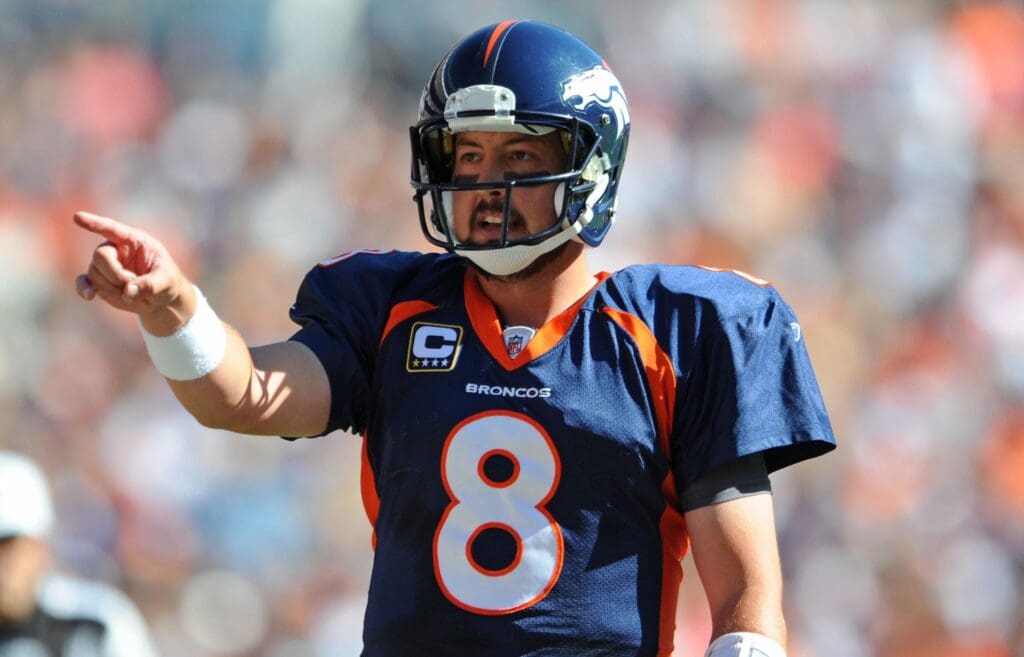 Sept 18, 2011; Englewood, CO, USA; Denver Broncos quarterback Kyle Orton (8) calls a signal against the Cincinnati Bengals late in the second quarter at Sports Authority Field.