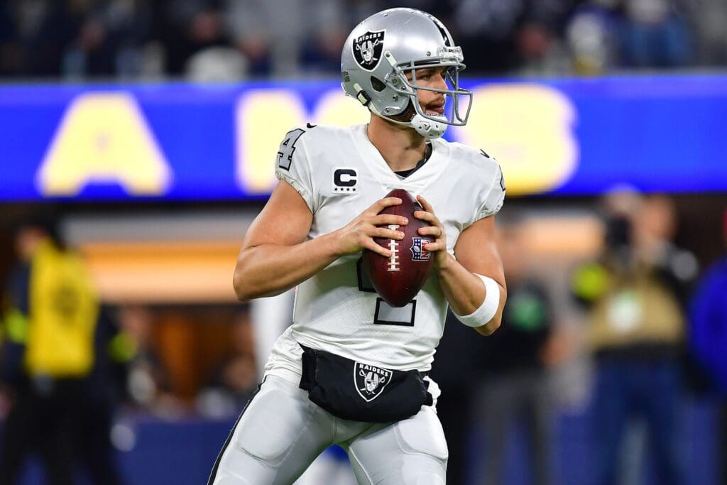 Dec 8, 2022; Inglewood, California, USA; Las Vegas Raiders quarterback Derek Carr (4) drops back to pass against the Los Angeles Rams during the first half at SoFi Stadium.